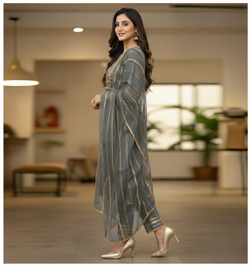 Asymmetrical Gota Patti Kurta Set – Light Gold Embroidered Bodice, Flounce Sleeves, Gold Trim Salwar Kameez With Sheer Gota Dupatta.