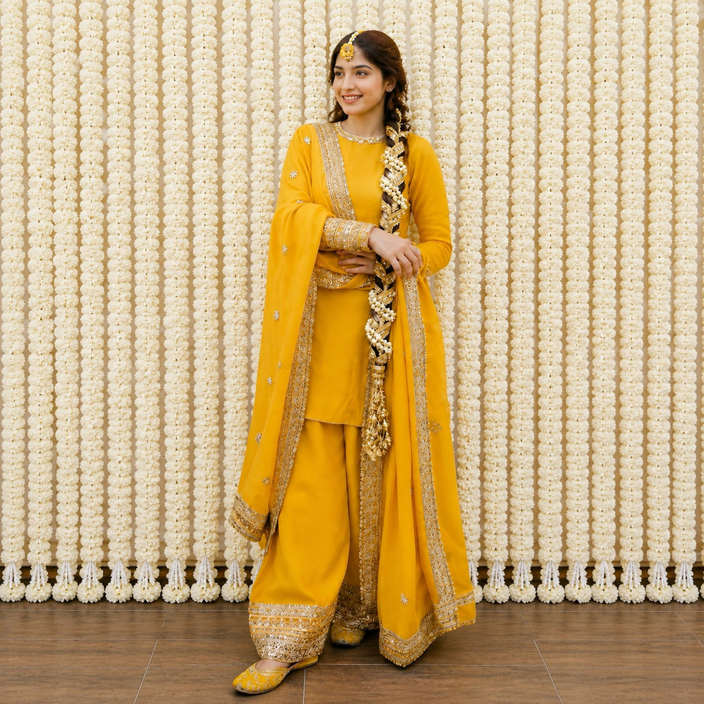 Elegant Yellow Lace Kurta Suit With Gold Embroidered Trousers